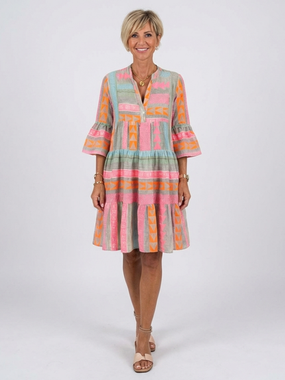 Maelle | Geometric Print V-Neck Tiered Dress in Knee Length