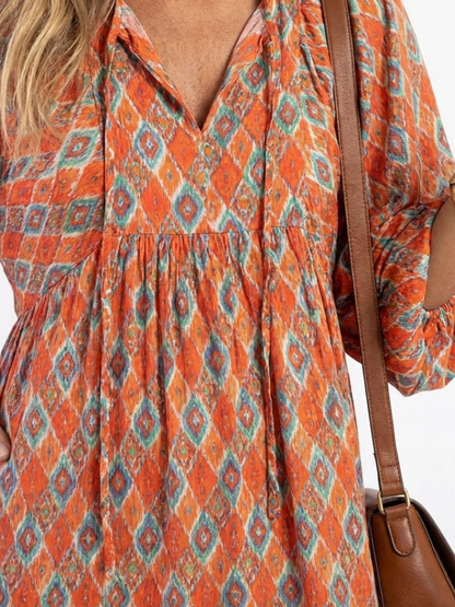 Amara | Geometric Print V-Neck Layered Midi Dress