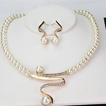 Set of a necklace and earrings with natural pearls
