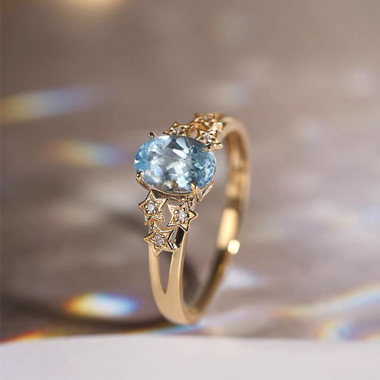 Exclusive Golden Ring with Blue Crystal