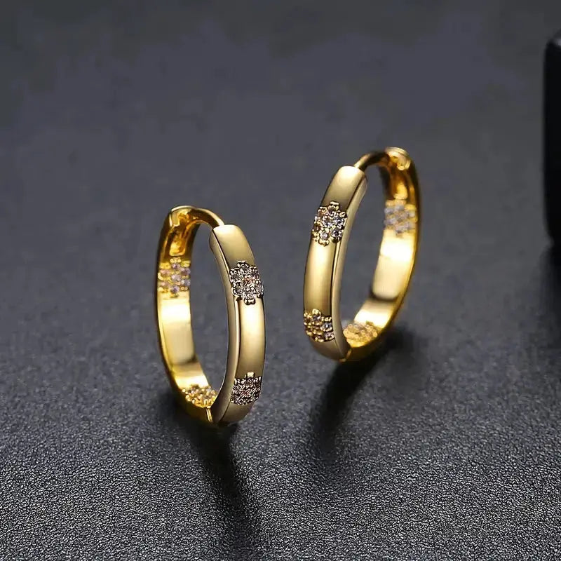 Vintage golden hoop earrings with flowers